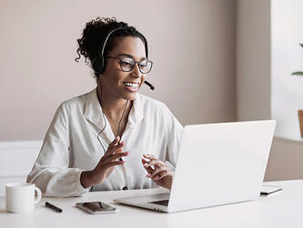 Woman on video call on laptop